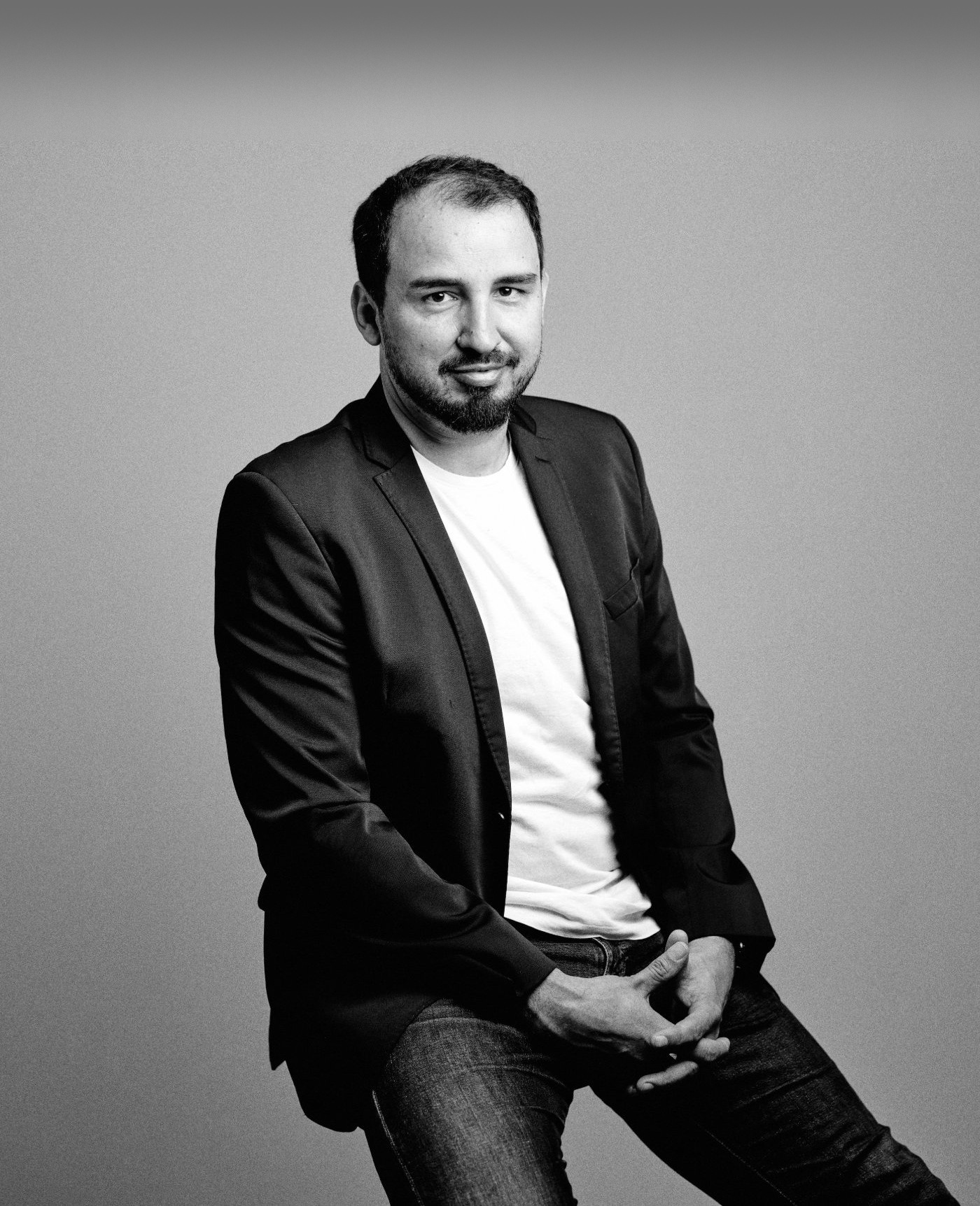 Peter Merc — black-and-white studio portrait